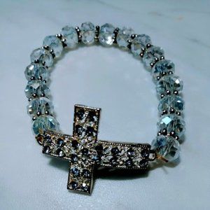 Beautiful glass bead silver tone cross stretch bracelet.